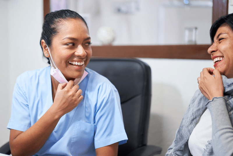 Dentist Office: Patient, Dentist
A dentist and a patient. Happy small business owner dentist in her clinic, talking with patient client