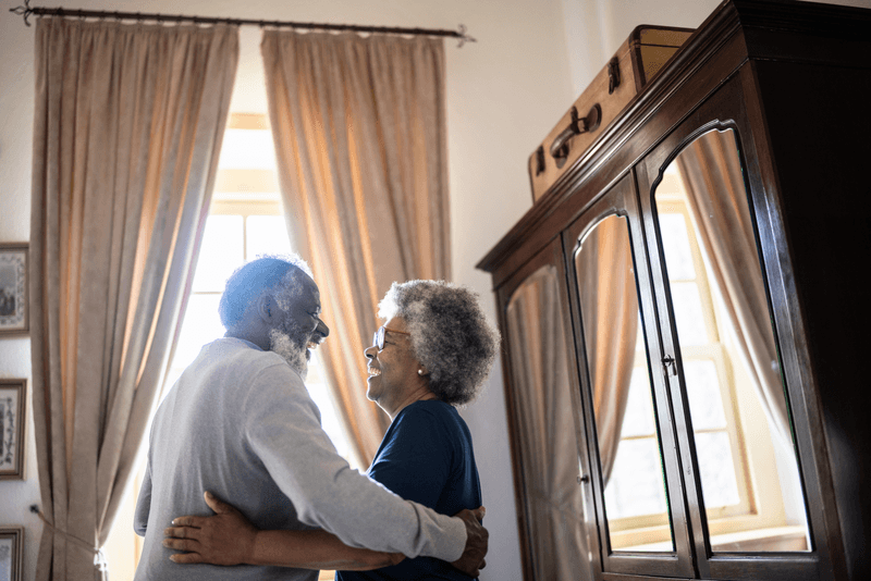 Senior couple dancing at home - stock photo
Senior couple dancing at home