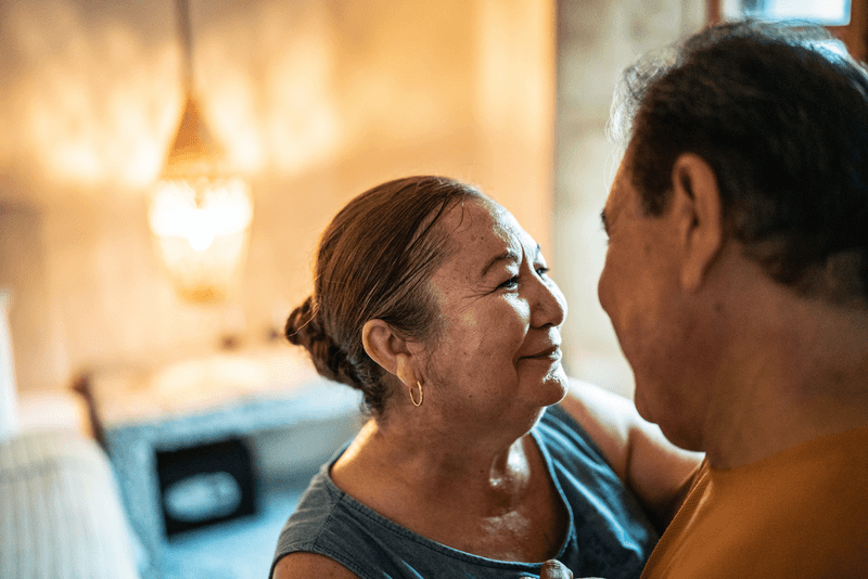 Mature couple dancing in the bedroom at home - stock photo
Mature couple dancing in the bedroom at home