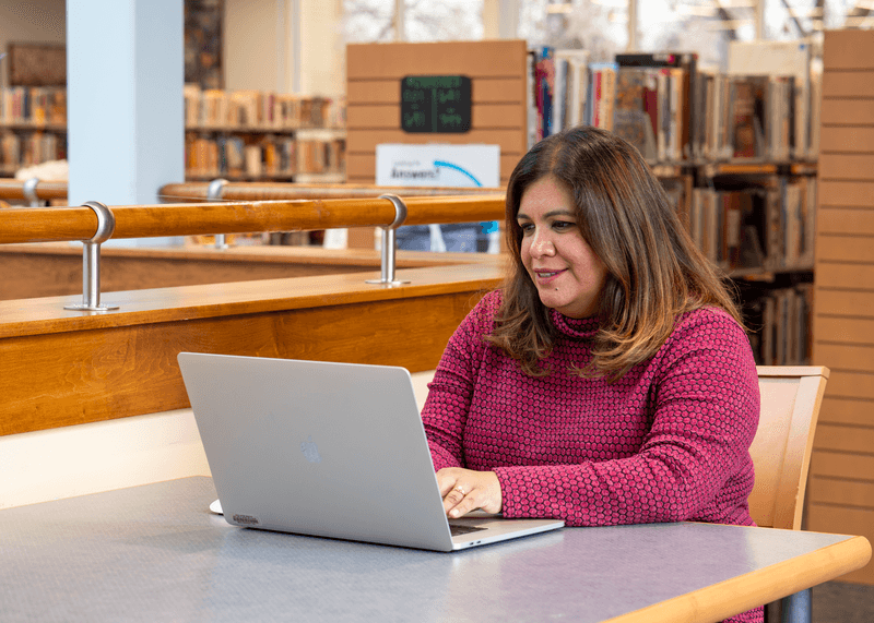 Photos of Hispanic community leaders using digital devices to login to MyWellSpan app.